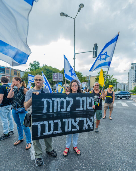Haifa, Israel - August 26, 2025: People protest and block the road, part of a Nationwide day of Protest for Gaza Hostage Deal in Haifa, Israel