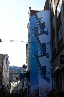 28-10-2014 Brussels, Belgium - Iconic Tintin mural adorns the streets of Brussels, captivating visitors with its charm clipart