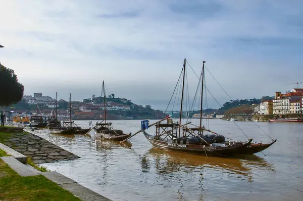 stock image 19-02-2015 Porto, Portugal - Panoramic view of Douro River from Vila Nova de Gaia with vintage sailboats