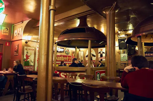 stock image 28-10-2014 Brussels, Belgium - Delirium Bar's interior adorned with beer brand posters creates an amazing atmosphere in Brussels