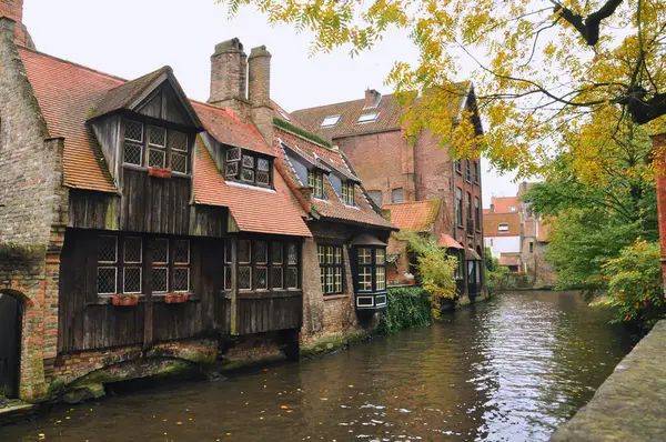 stock image 30-10-2014 Brussels, Belgium - Picturesque wooden houses line the canal, showcasing Bruges classic charm and beauty