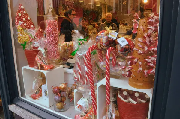 stock image 30-10-2014 Brussels, Belgium - A candy store window displaying an array of colorful candy canes