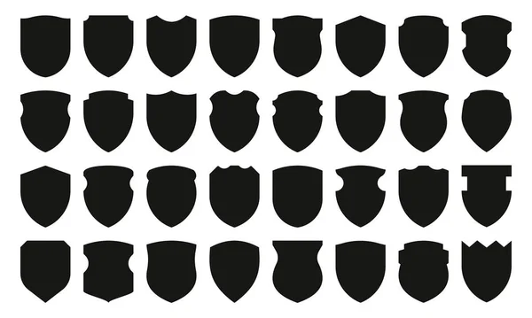 Collection Boucliers Noirs Silhouettes Monochromes Protection Médiévale Insignes Sécurité Vierges — Image vectorielle