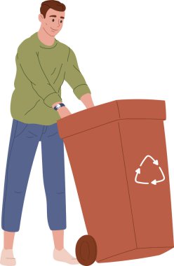 Genç adam tekerlekli büyük bir geri dönüşüm kutusunu itiyor, atık yönetimine aktif olarak katılıyor ve sorumlu geri dönüşüm uygulamaları yoluyla çevre bilincini artırıyor