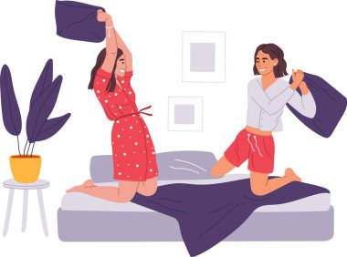 İki neşeli bayan arkadaş, rahat bir evde ya da otel odasında, rahat bir pijama partisinde şakacı bir yastık kavgasına tutuşuyorlar.