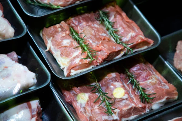 stock image raw meat on the bench in the store