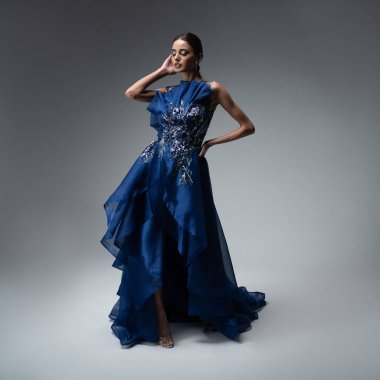 a model in an elegant evening dress 
