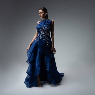 a model in an elegant evening dress 