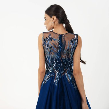 a model in an elegant evening dress 