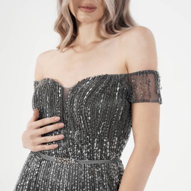 a model in an elegant evening dress 