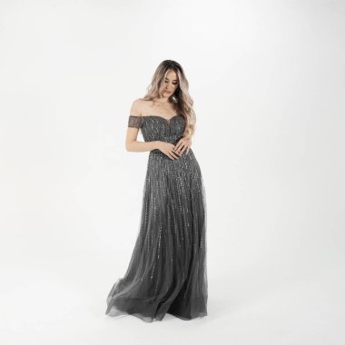 a model in an elegant evening dress 