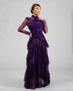 a model in an elegant evening dress dress