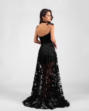 a model in an elegant evening dress dress