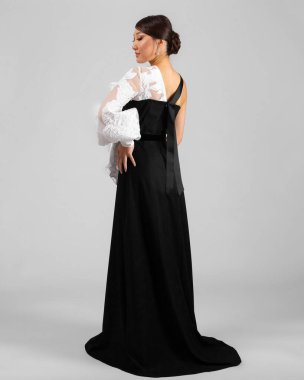 a model in an elegant evening dress dress