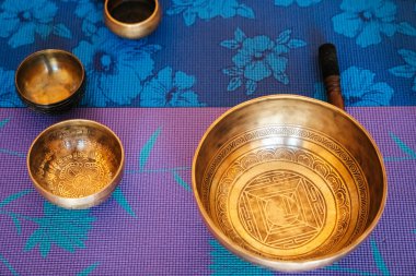 view from above Tibetan singing bowl in sound therapy