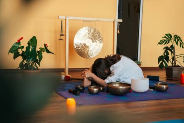girls on a yoga class. Girls doing yoga and breathing practices 
