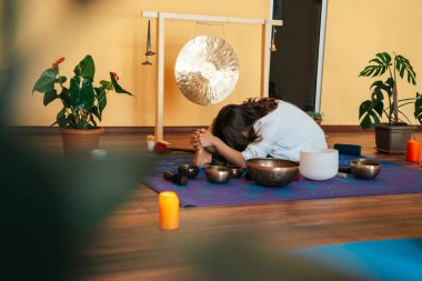 girls on a yoga class. Girls doing yoga and breathing practices 