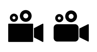 Video kamera ikonu vektörü beyaz arkaplanda izole edildi. Video kamera vektör simgesi. Kamera Simgeleri. Film tabelası. Sinema