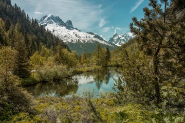mountain river with blue sky in background, travel concept
