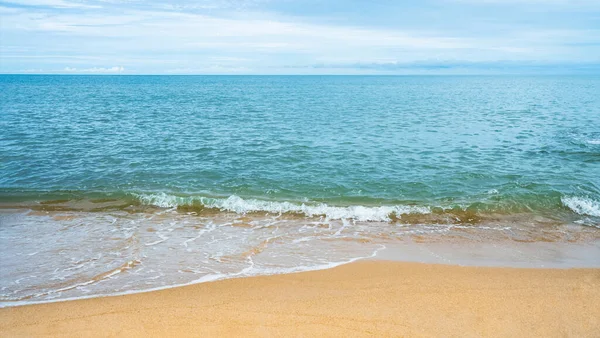 stock image Sand beach with Summer Sky. Panoramic Seaside with Ocean wave landscape. Tropical beach and seascape with Blue Sky and soft sand, with calmness, tranquil relaxing day in South of thailand