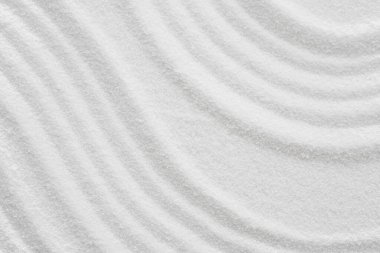 Beyaz kum dokusu arka planında eşmerkezli daire şeklinde Zen Bahçesi, Japon Zen Bahçesi, Zen benzeri konsept.