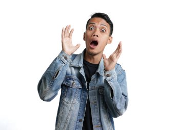 asian man wearing blue jean jacket with excited surprised gesture, isolated on white background