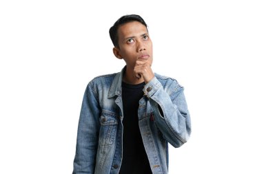 asian man wearing blue jean jacket showing expression thinking looking for idea, isolated on white background