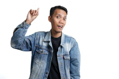 asian man wearing blue jean jacket gesturing get idea, isolated on white background