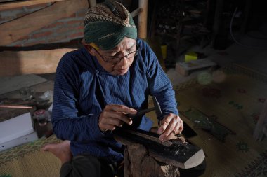 Keris craftsmen in the workshop, in the process of making keris. : Bantul, Indonesia - 25 August 2022