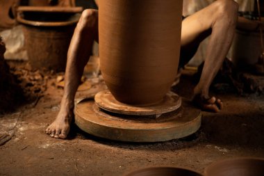 The process of forming traditional pottery crafts, located in Kasongan, Yogyakarta, Indonesia