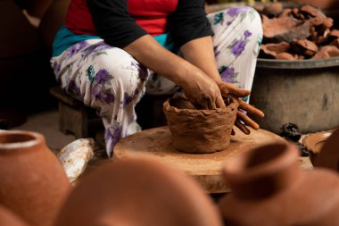 The process of forming traditional pottery crafts, located in Kasongan, Yogyakarta, Indonesia