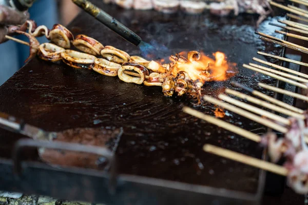 Stock image close up of delicious satay grilled squid, for sale in street food