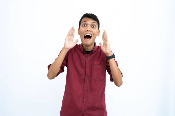 stock image asian man, businessman or student concept wearing red casual shirt pose surprised happy and get new spirit. Isolated white background.