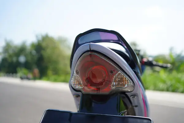 stock image closeup, 4-Stroke underbone motorcycle taillight