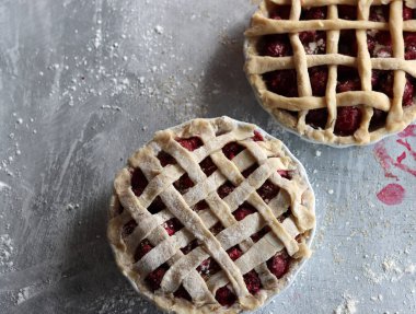 Lattice sweet cherry pie close up photo. Homemade tart with no sugar added. Healthy eating concept. 