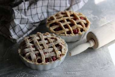 Lattice sweet cherry pie close up photo. Homemade tart with no sugar added. Healthy eating concept. 