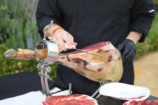 Stock image Detail of an Iberian ham cut by a professional. Concept pork, food, ham, iberian, spain, denomination of origin.