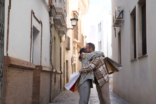 Real Marriage Gay Couple Hugging Street Hands Full Shopping Bags — Stock Photo, Image