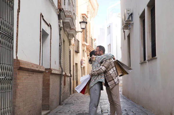 Real Marriage Gay Couple Hugging Street Hands Full Shopping Bags — Stock Photo, Image