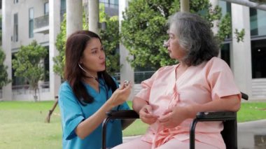 Asian female doctor checking the health of elderly patients. Concept of medical services in a hospital. surgical treatment of patients
