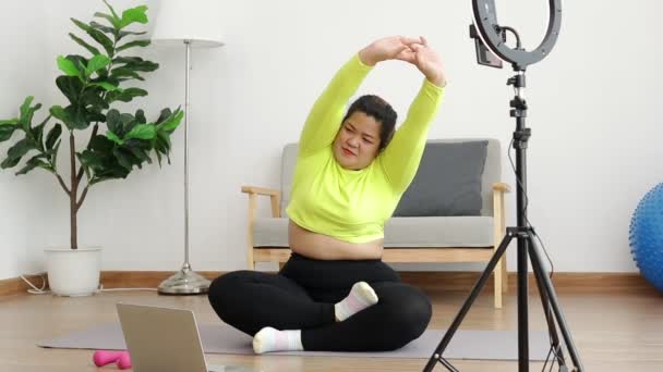 Fat Woman Blogger Athlete Sportswear Exercise Room Publish Content Online — Video
