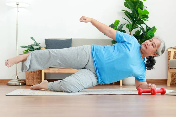 Asian Senior Woman Exercising Home Living Room Lie Your Side — Stock Photo, Image