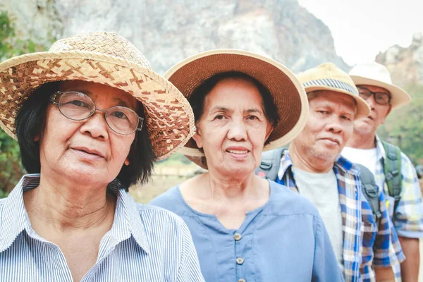 Asian elderly tourists Nature tourism. The concept of aging society. Senior tourists. Living in retirement to be happy