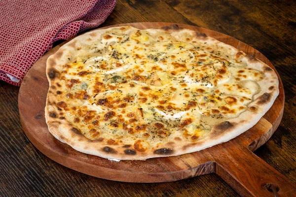 stock image cheese pizza close up on a table