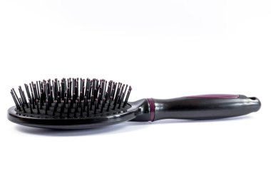 beyaz zemin üzerinde saç fırçası