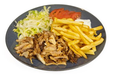 plate of kebab and fries close-up, isolated on a white background