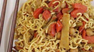 chinese noodle with carrot and bamboo shoot