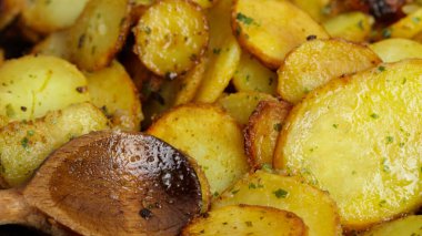 Sarladaise potatoes cooking in a pan