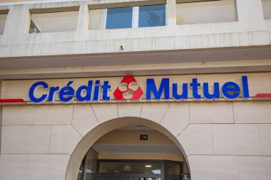 storefront of a Credit Mutuel bank in Saint-Raphael