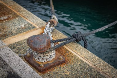 close-up mooring bollard on a pier